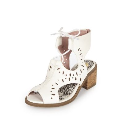 Girls white laser cut heel shoes